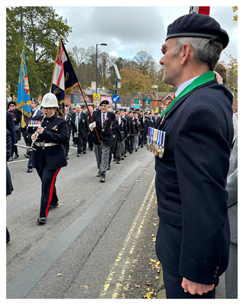 Chairman of Horndean Parish Council taking the salute